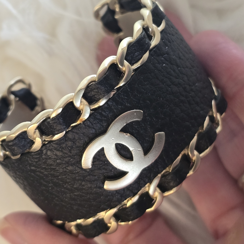 CHANEL Black and Gold Cuff Bracelet with Chain Detail